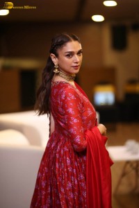 Indian actress Aditi Rao Hydari in a red lehenga choli dress