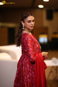 Indian actress Aditi Rao Hydari in a red lehenga choli dress