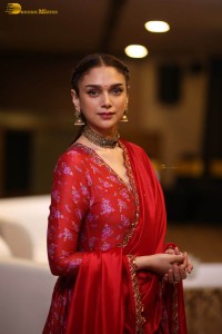 Indian actress Aditi Rao Hydari in a red lehenga choli dress