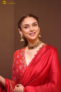 Indian actress Aditi Rao Hydari in a red lehenga choli dress