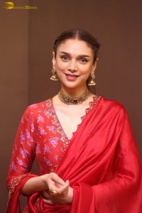 Indian actress Aditi Rao Hydari in a red lehenga choli dress