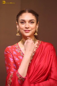 Indian actress Aditi Rao Hydari in a red lehenga choli dress
