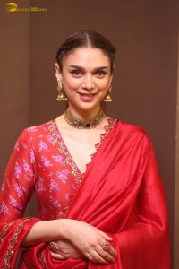Indian actress Aditi Rao Hydari in a red lehenga choli dress