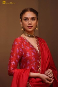 Indian actress Aditi Rao Hydari in a red lehenga choli dress