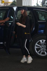 actress Aditi Rao Hydari in a black dress at airport