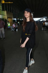 actress Aditi Rao Hydari in a black dress at airport