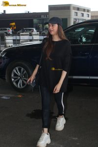 actress Aditi Rao Hydari in a black dress at airport