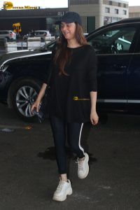 actress Aditi Rao Hydari in a black dress at airport