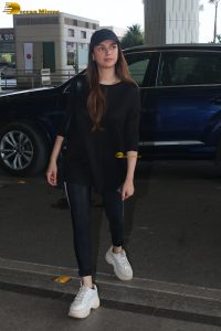 actress Aditi Rao Hydari in a black dress at airport