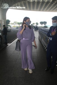 Aditi Rao Hydari in a violet dress at Mumbai Airport on November 14