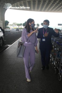 Aditi Rao Hydari in a violet dress at Mumbai Airport on November 14