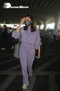 Aditi Rao Hydari in a violet dress at Mumbai Airport on November 14