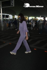 Aditi Rao Hydari in a violet dress at Mumbai Airport on November 14