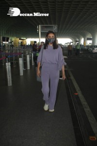 Aditi Rao Hydari in a violet dress at Mumbai Airport on November 14