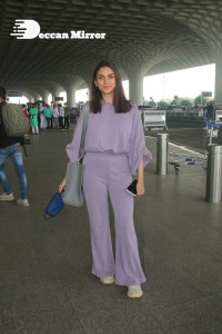 Aditi Rao Hydari in a violet dress at Mumbai Airport on November 14