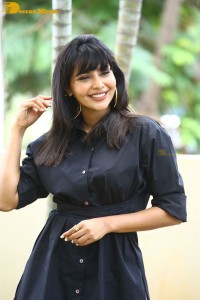Actress Aishwarya Lekshmi photoshoot in a black dress