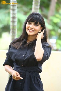 Actress Aishwarya Lekshmi photoshoot in a black dress