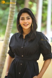Actress Aishwarya Lekshmi photoshoot in a black dress