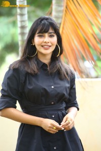 Actress Aishwarya Lekshmi photoshoot in a black dress