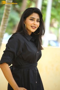 Actress Aishwarya Lekshmi photoshoot in a black dress
