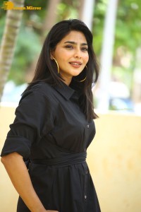 Actress Aishwarya Lekshmi photoshoot in a black dress