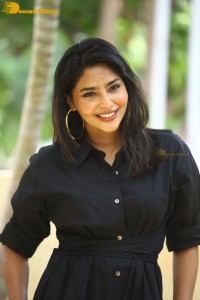 Actress Aishwarya Lekshmi photoshoot in a black dress