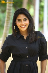 Actress Aishwarya Lekshmi photoshoot in a black dress