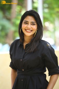 Actress Aishwarya Lekshmi photoshoot in a black dress