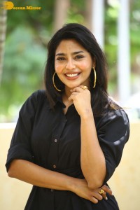 Actress Aishwarya Lekshmi photoshoot in a black dress