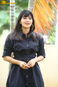 Actress Aishwarya Lekshmi photoshoot in a black dress