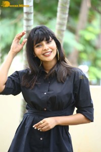 Actress Aishwarya Lekshmi photoshoot in a black dress