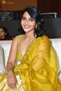 actress aishwarya lekshmi gorgeous looks in a green lehenga choli at a movie function