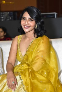 actress aishwarya lekshmi gorgeous looks in a green lehenga choli at a movie function