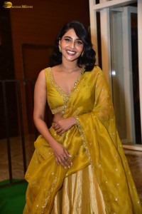 actress aishwarya lekshmi gorgeous looks in a green lehenga choli at a movie function