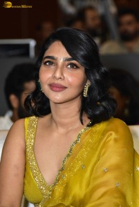 actress aishwarya lekshmi gorgeous looks in a green lehenga choli at a movie function