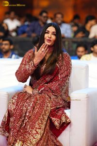 bollywood star Aishwarya Rai in a red salwar dress at ponniyin selvan event