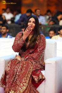 bollywood star Aishwarya Rai in a red salwar dress at ponniyin selvan event