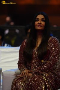 bollywood star Aishwarya Rai in a red salwar dress at ponniyin selvan event