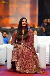 bollywood star Aishwarya Rai in a red salwar dress at ponniyin selvan event