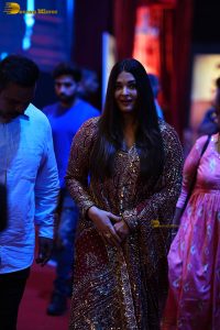 bollywood star Aishwarya Rai in a red salwar dress at ponniyin selvan event