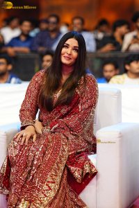 bollywood star Aishwarya Rai in a red salwar dress at ponniyin selvan event