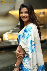 actress Aishwarya Rajesh cute in a white and blue dress