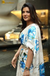 actress Aishwarya Rajesh cute in a white and blue dress