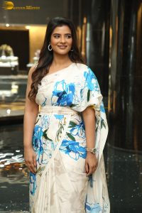 actress Aishwarya Rajesh cute in a white and blue dress