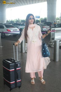actress Akanksha Puri stylish in a salwar dress at airport