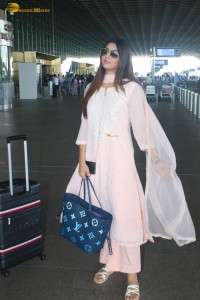 actress Akanksha Puri stylish in a salwar dress at airport