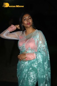 Actress Akshatha Srinivas Photoshoot in a transparent green saree