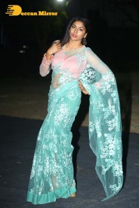 Actress Akshatha Srinivas Photoshoot in a transparent green saree