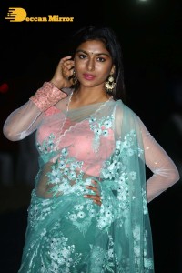 Actress Akshatha Srinivas Photoshoot in a transparent green saree