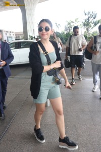 actress Alaya F in a green dress at mumbai airport